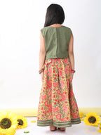 Green sleeveless embroidered blouse paired with printed lehenga