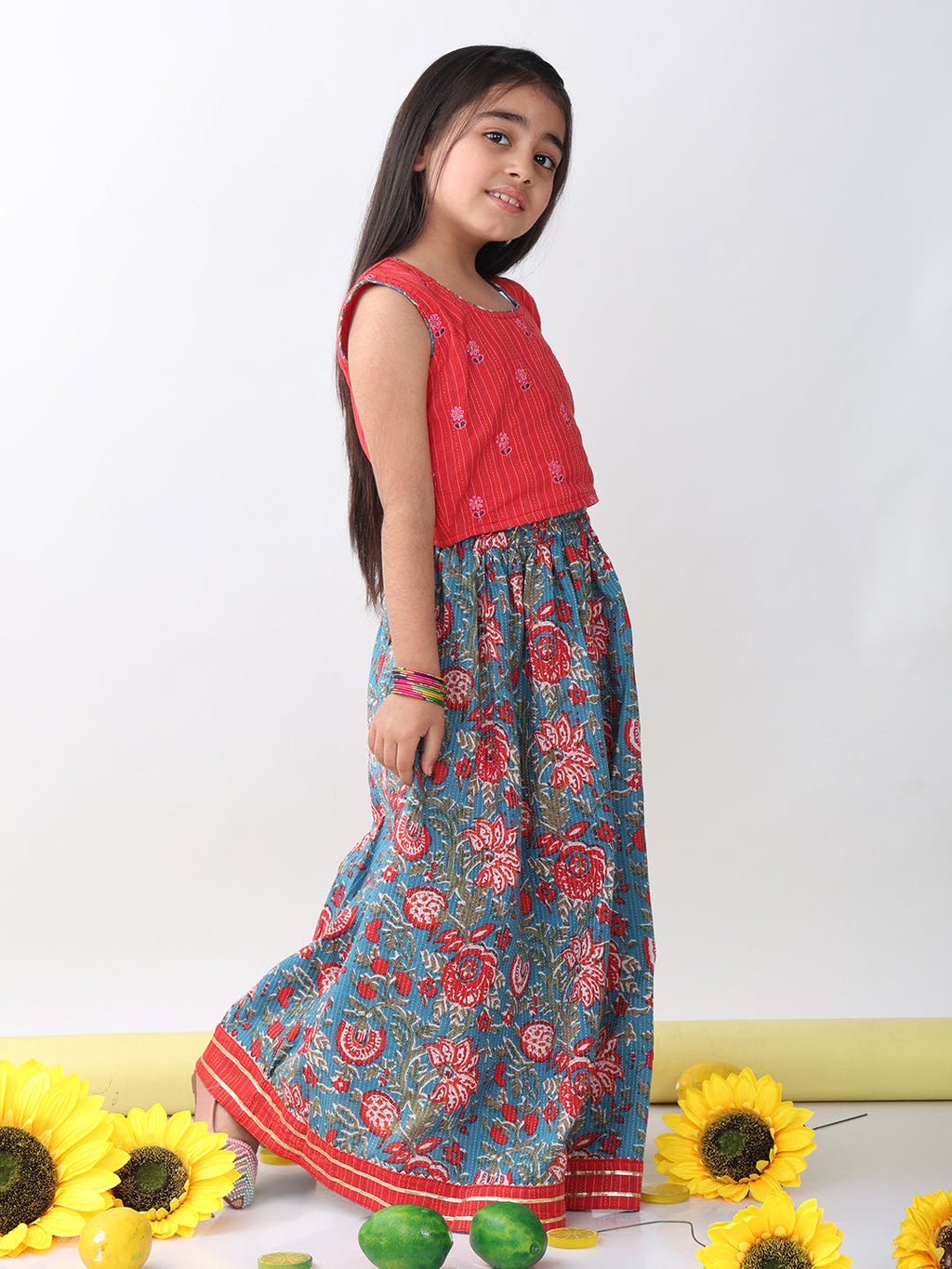 Red sleeveless embroidered blouse paired with printed lehenga- Red Blue