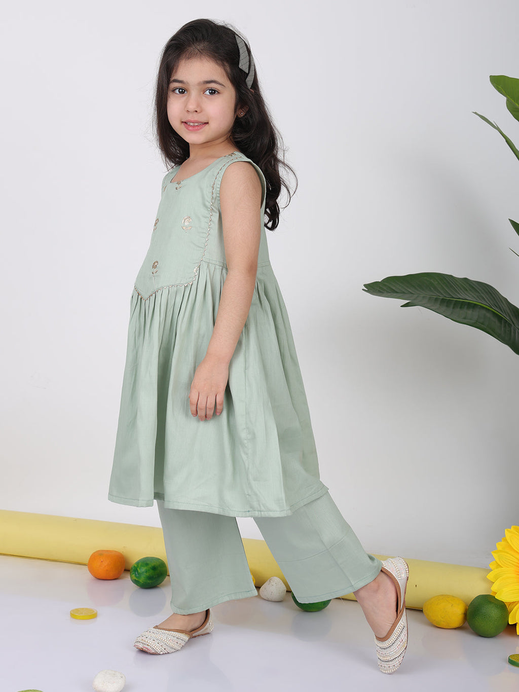 Green sleeveless embroidered Kurti with pant