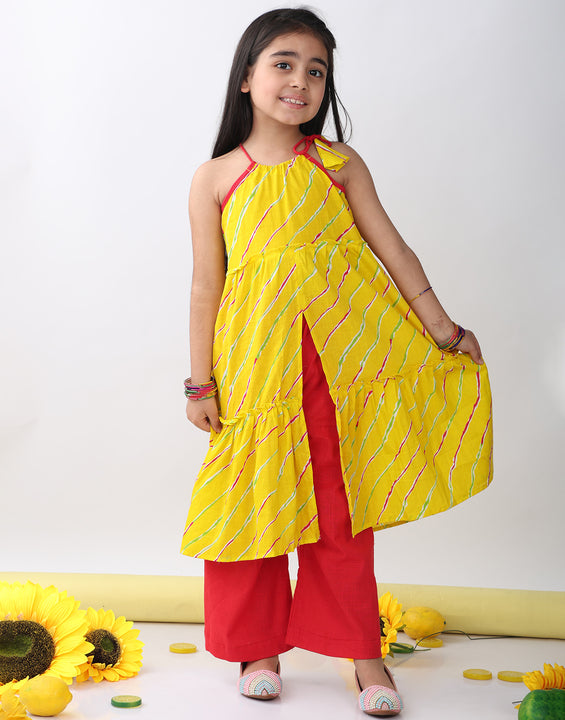 Yellow sleeveless lehriya Kurti with red pant