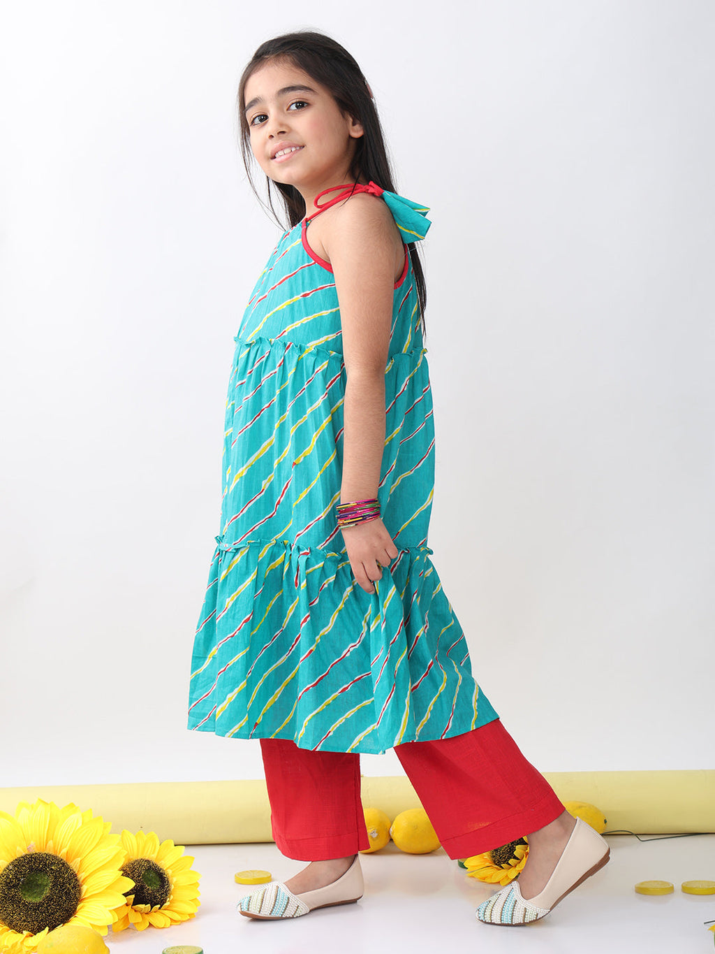 Blue sleeveless lehriya Kurti with red pant