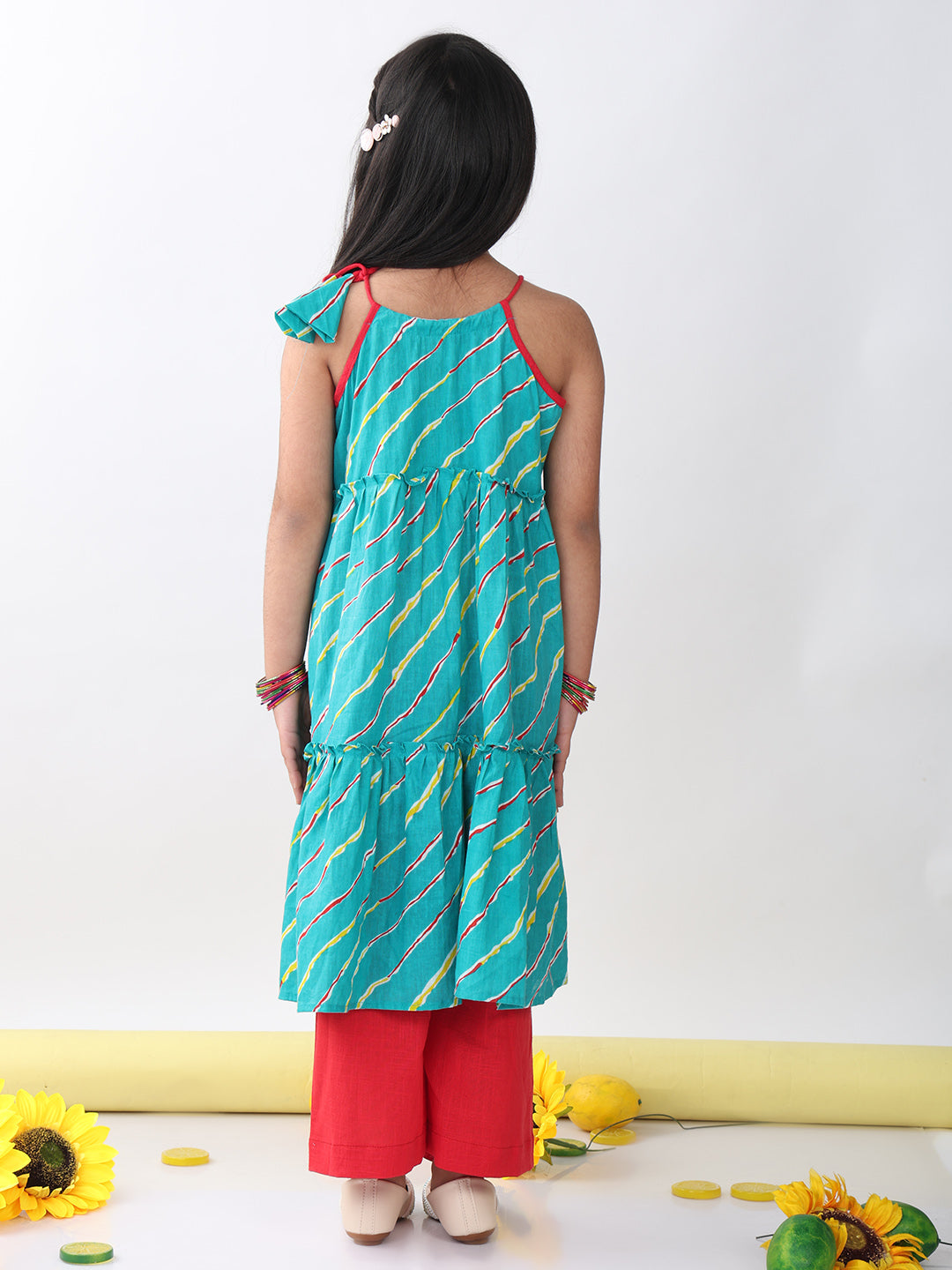 Blue sleeveless lehriya Kurti with red pant