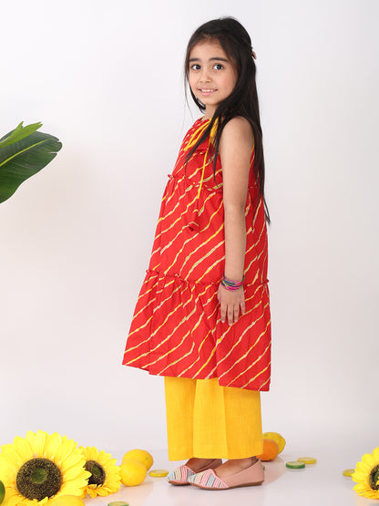 Red sleeveless lehriya Kurti with yellow pant