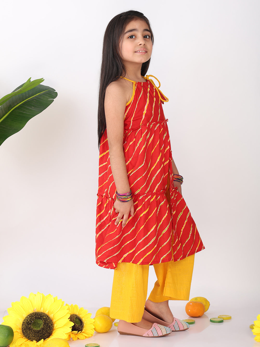 Red sleeveless lehriya Kurti with yellow pant