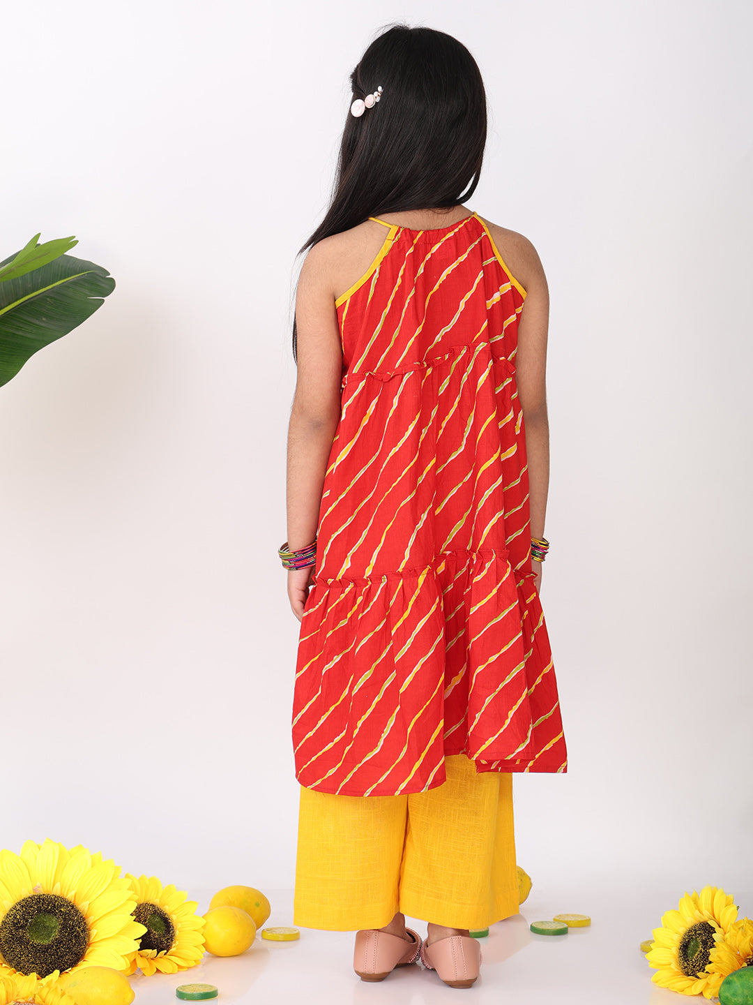 Red sleeveless lehriya Kurti with yellow pant