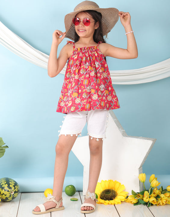 Red sleeveless Top with white short pant