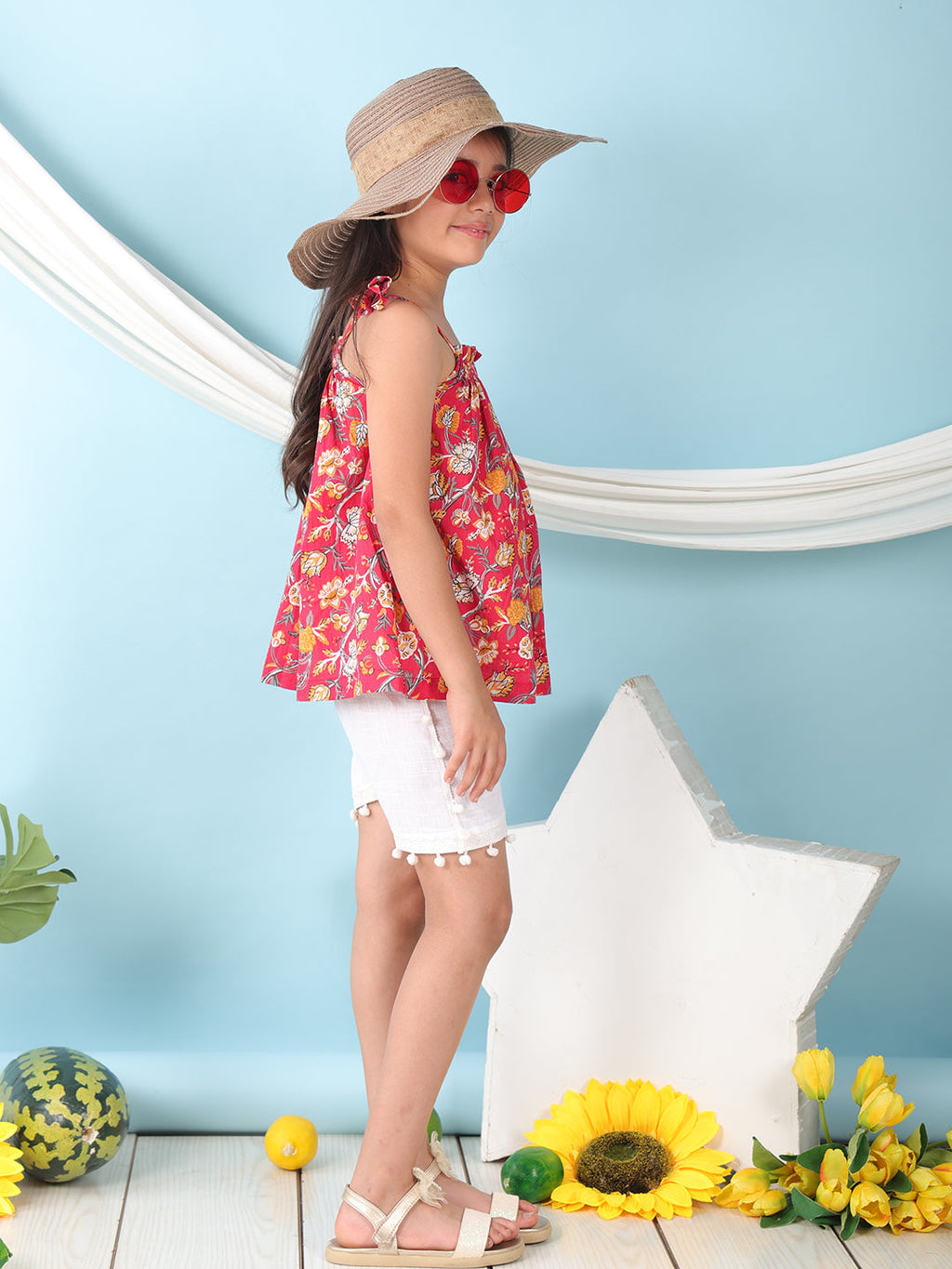 Red sleeveless Top with white short pant
