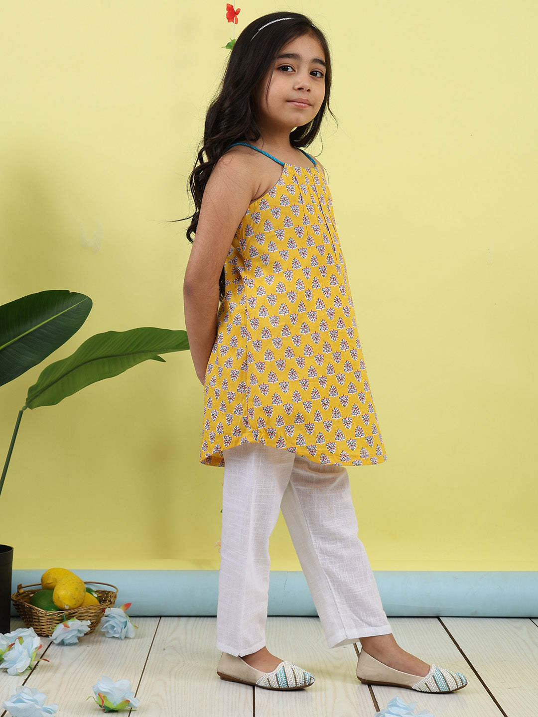 Yellow Floral sleeveless kurti with white pant