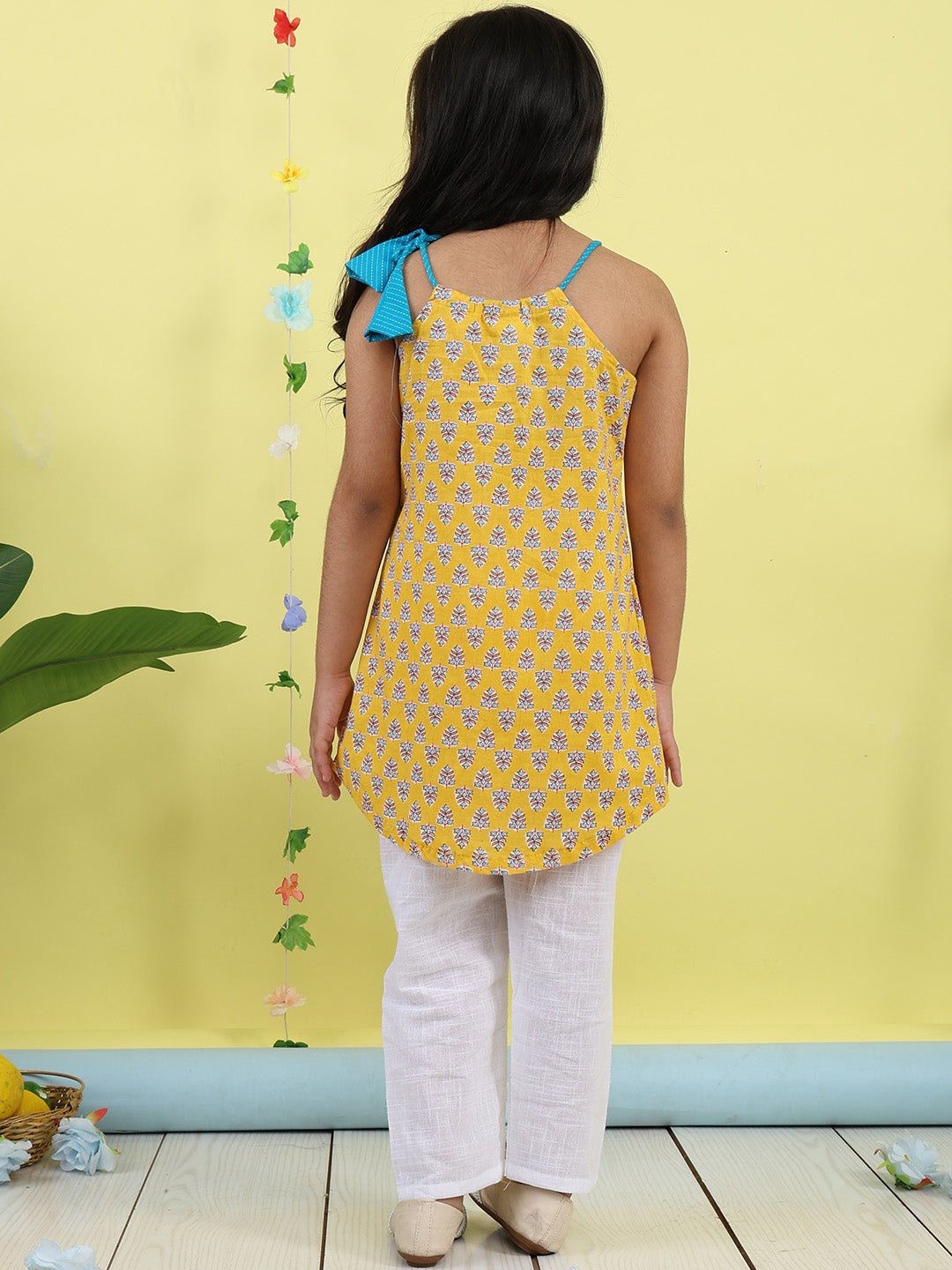 Yellow Floral sleeveless kurti with white pant