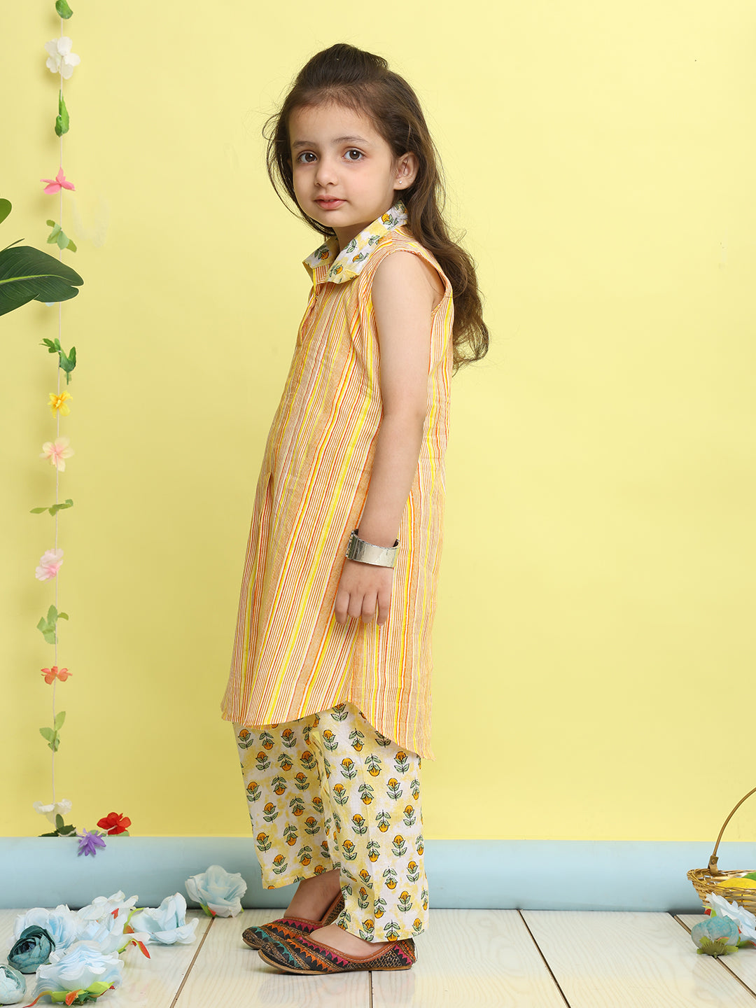 Yellow stripped sleeveless kurti with Floral pant