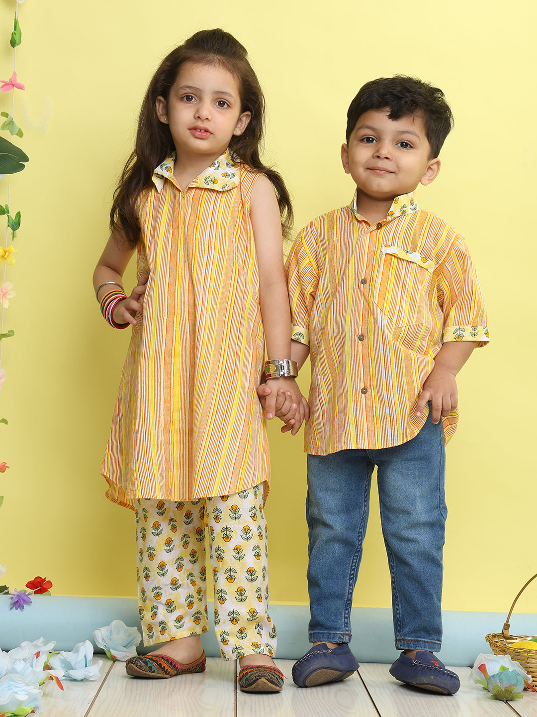 Yellow stripped sleeveless kurti with Floral pant