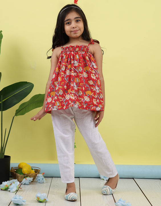 Red sleeveless Top with white  pant