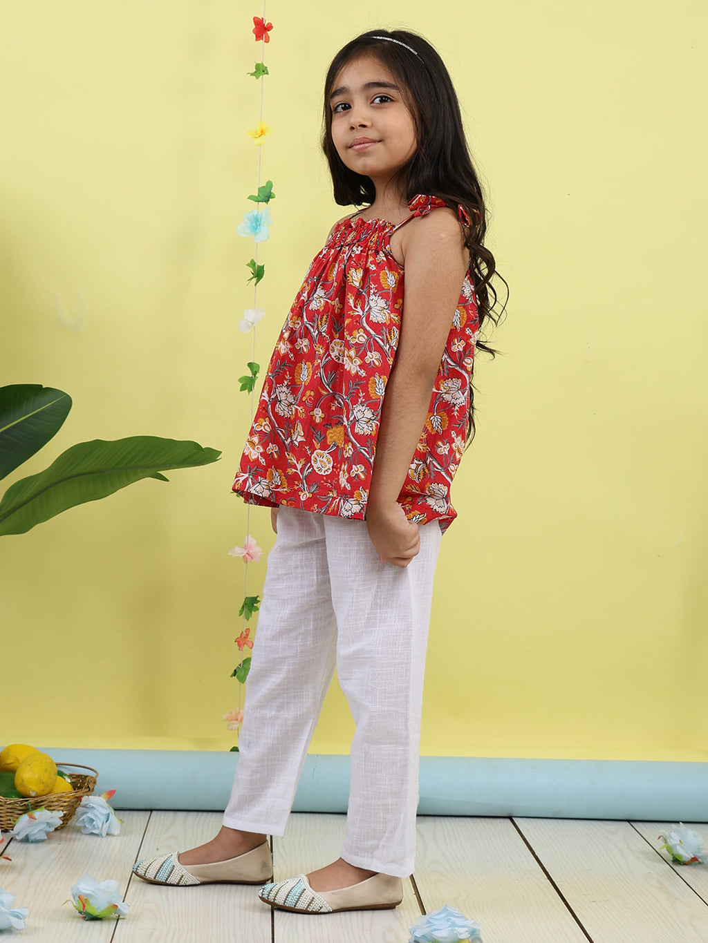 Red sleeveless Top with white  pant
