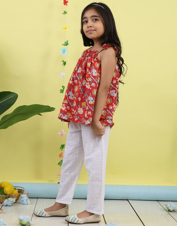 Red sleeveless Top with white  pant