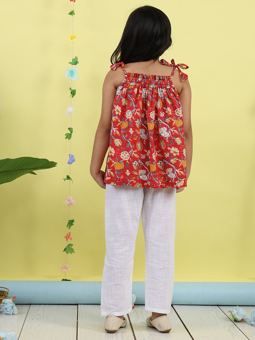 Red sleeveless Top with white  pant