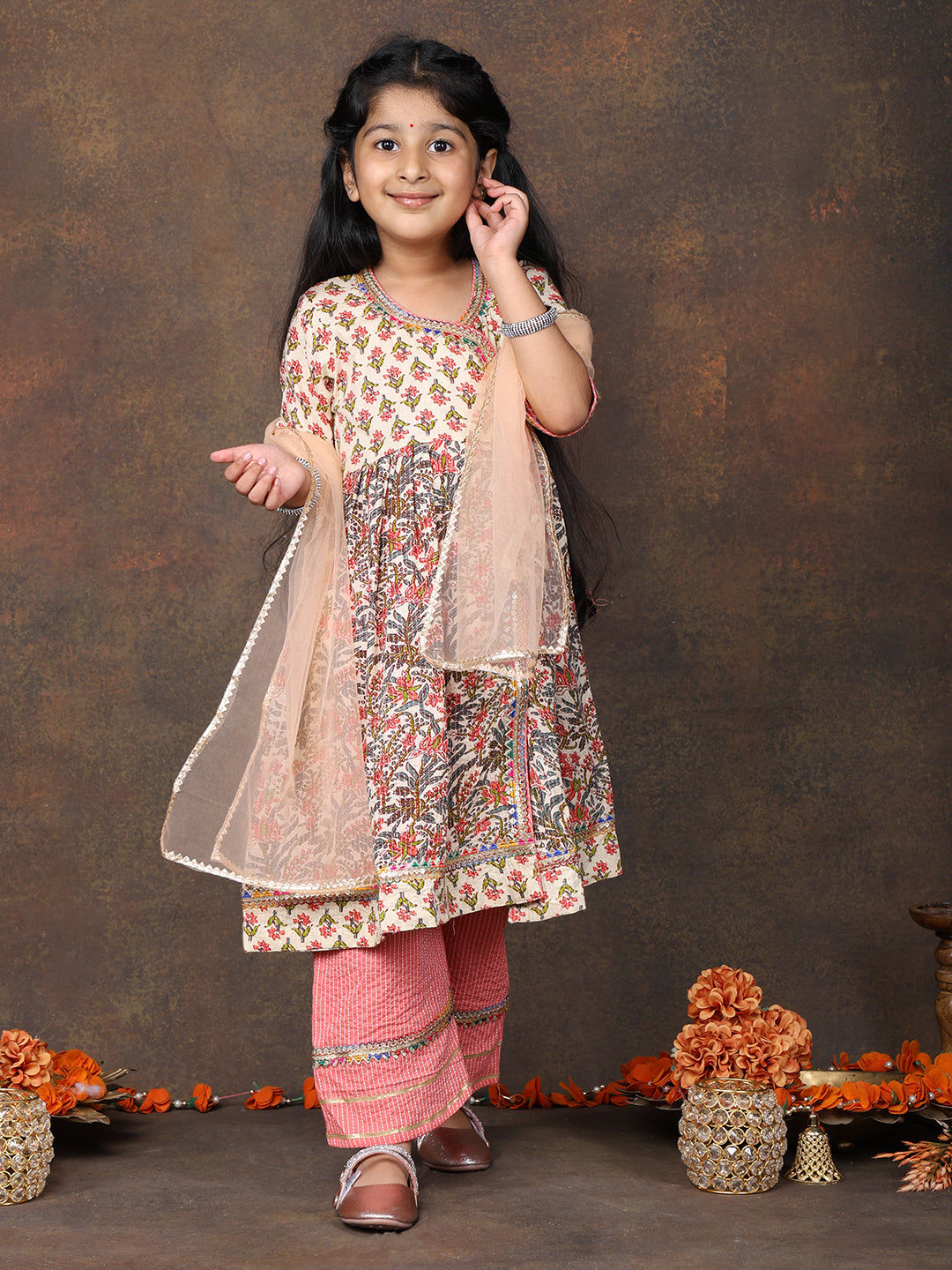 Peach 3/4 sleeves printed cotton Angrakha Kurti  paired with Peach Plazo pant and dupatta