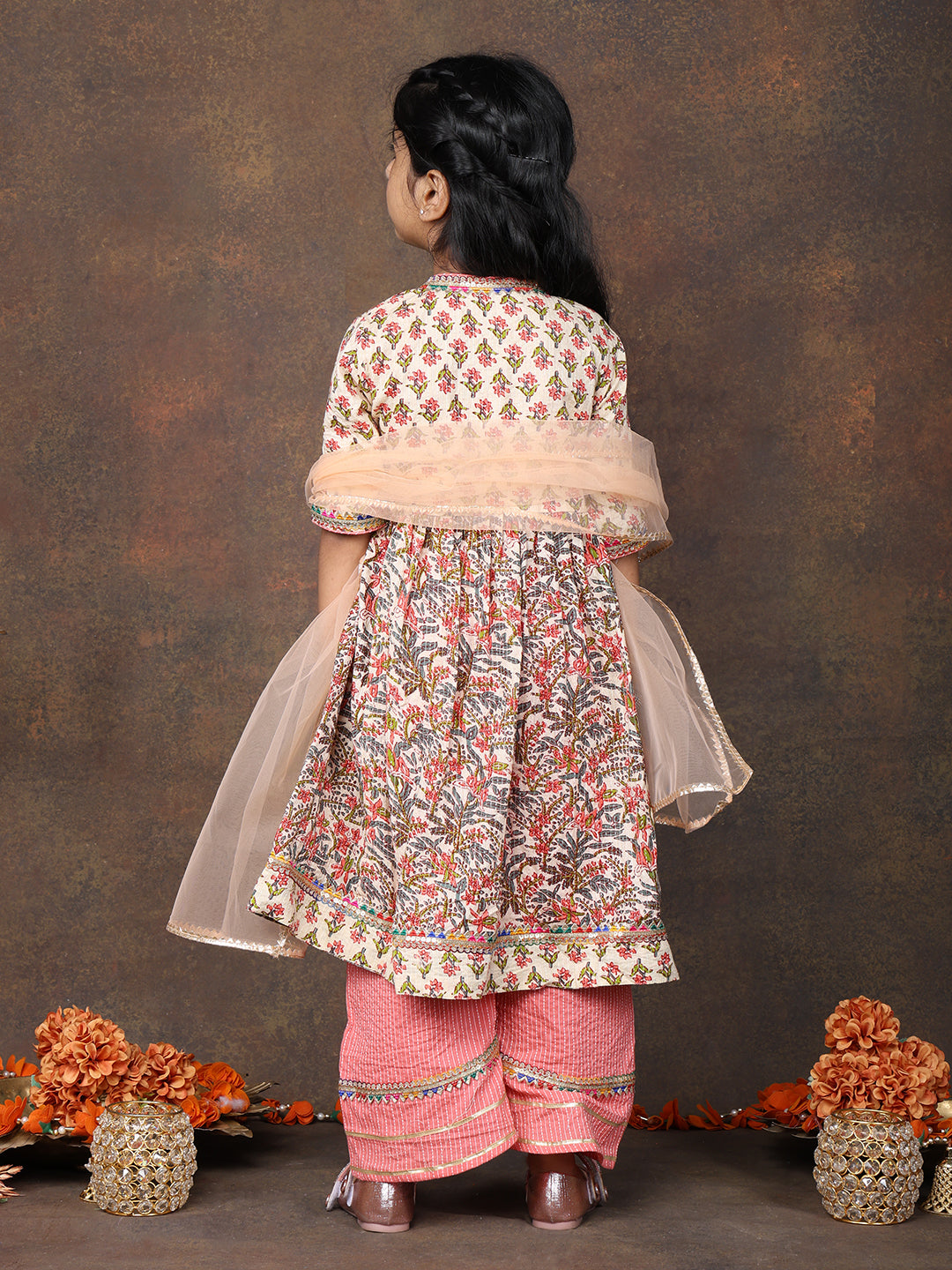 Peach 3/4 sleeves printed cotton Angrakha Kurti  paired with Peach Plazo pant and dupatta