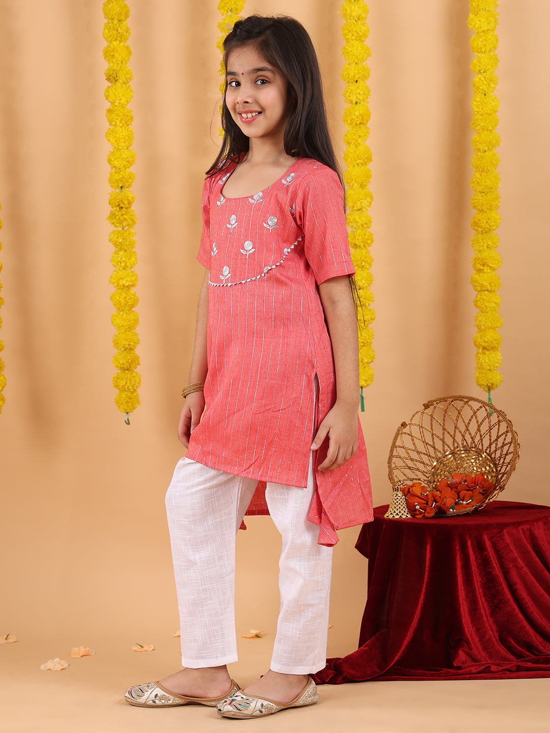 Peach embroidered 3/4 sleeves Kurti with white pant