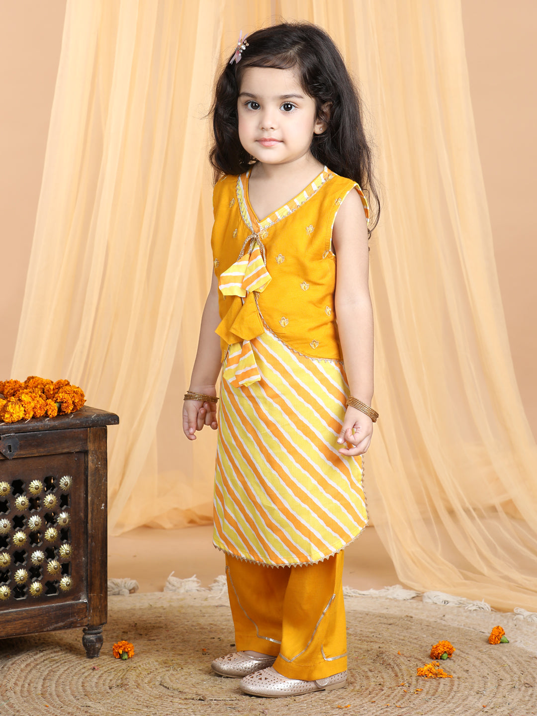 Yellow Lehriya Kurti with attached embroidered jacket paired with pant