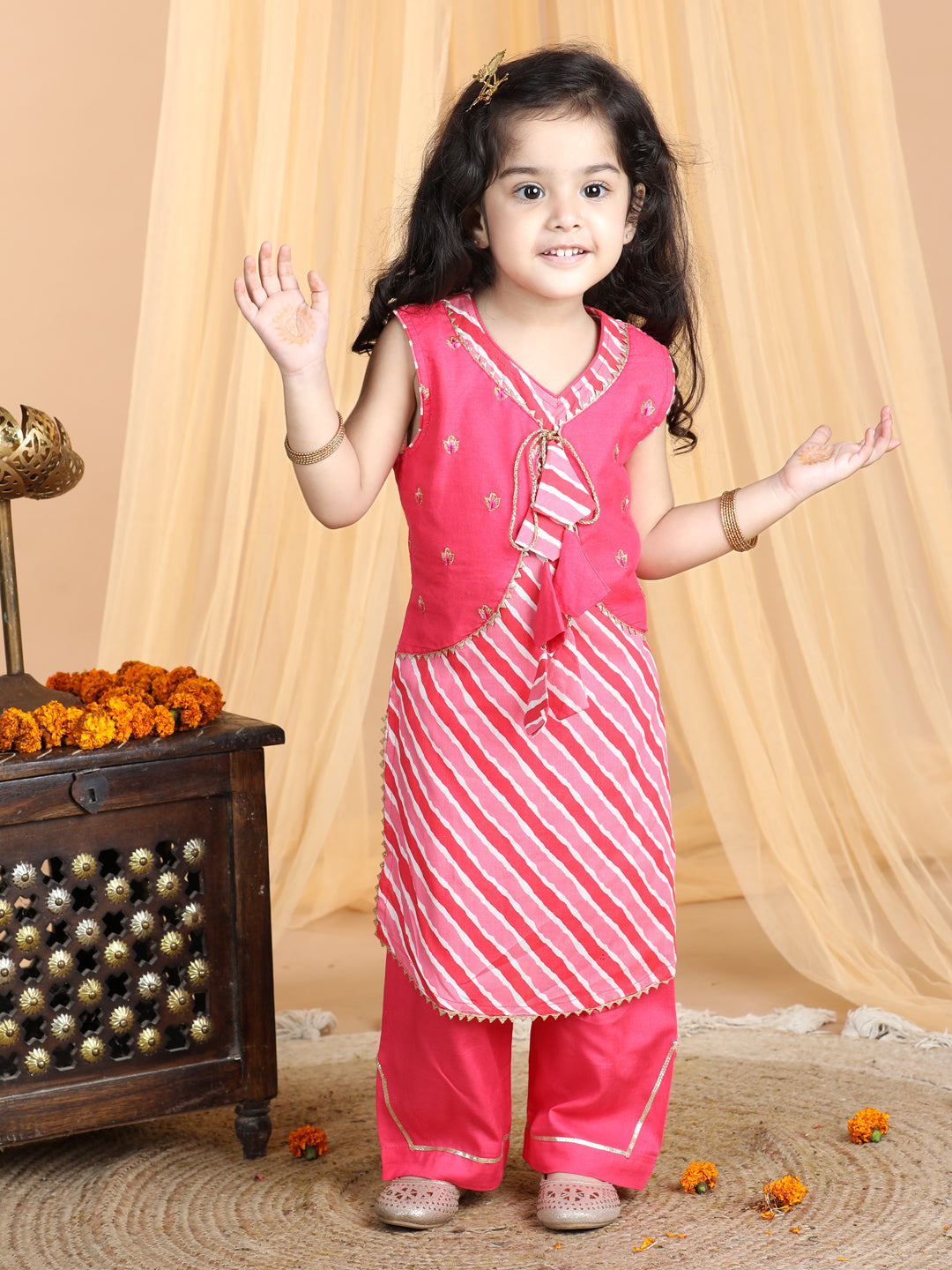 Pink Lehriya Kurti with attached embroidered jacket paired with pant