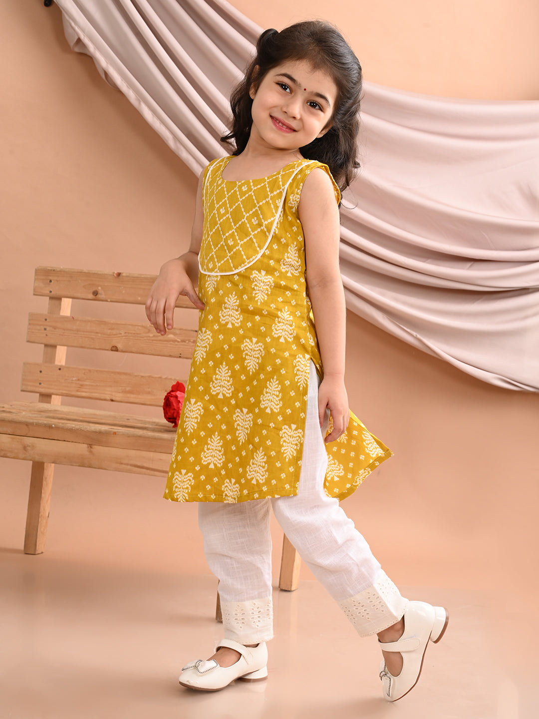 Yellow Sleeveless Floral Printed Kurti with White Pant