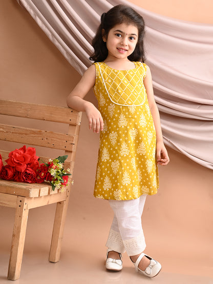 Yellow Sleeveless Floral Printed Kurti with White Pant