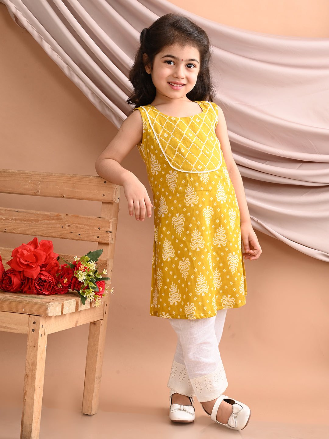 Yellow Sleeveless Floral Printed Kurti with White Pant