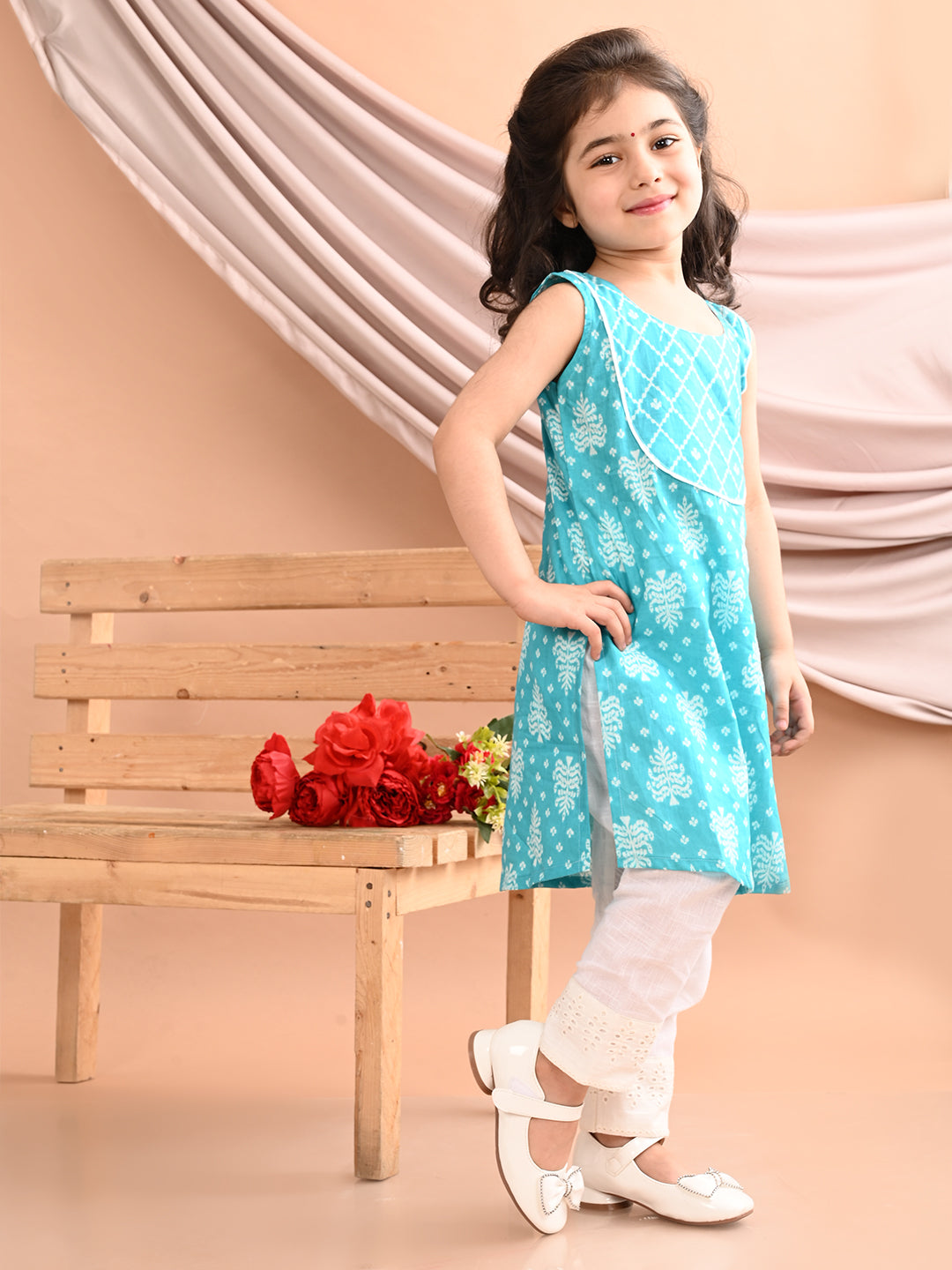 Blue Sleeveless Floral Printed Kurti with White Pant