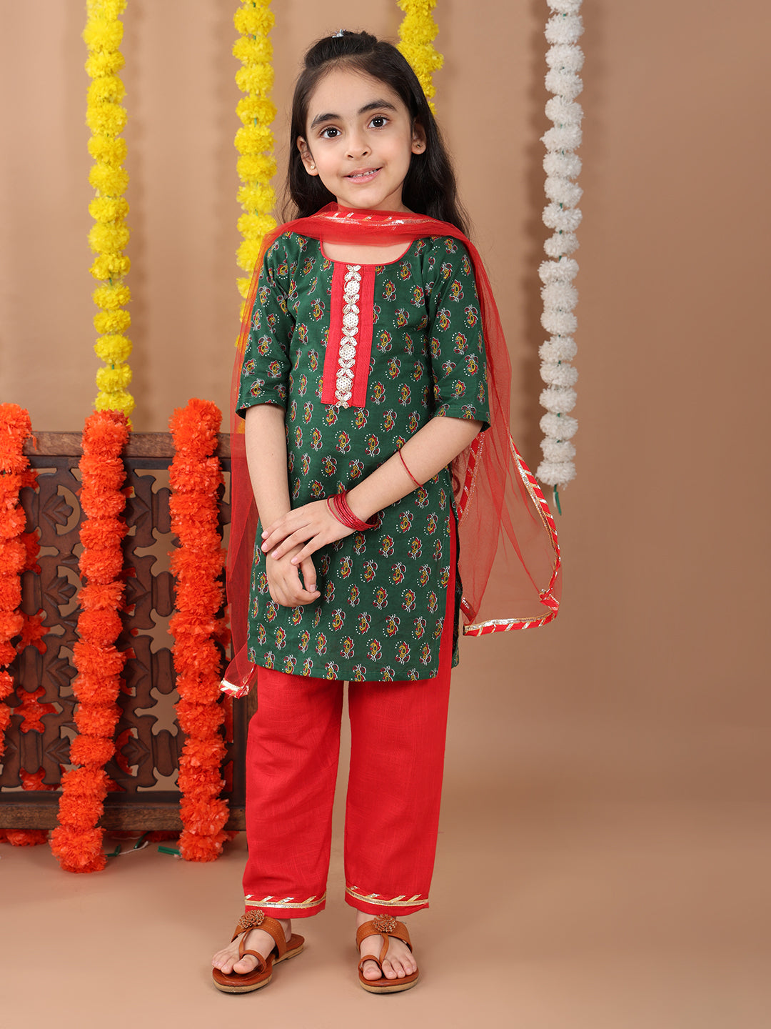 Green 3/4 sleeves printed cotton kurti with Red Plazo pant and dupatta