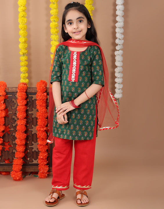 Green 3/4 sleeves printed cotton kurti with Red Plazo pant and dupatta