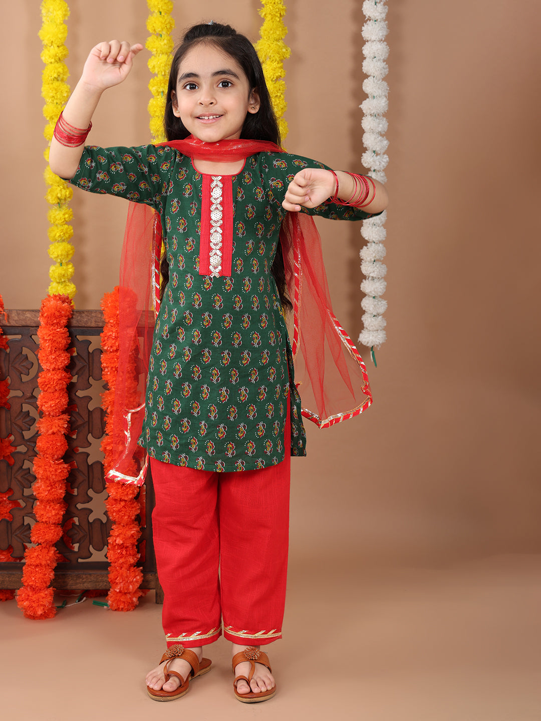 Green 3/4 sleeves printed cotton kurti with Red Plazo pant and dupatta