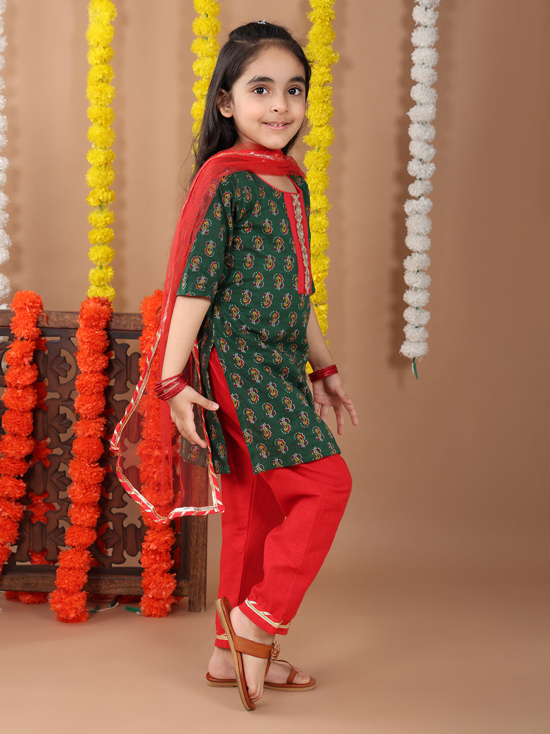 Green 3/4 sleeves printed cotton kurti with Red Plazo pant and dupatta