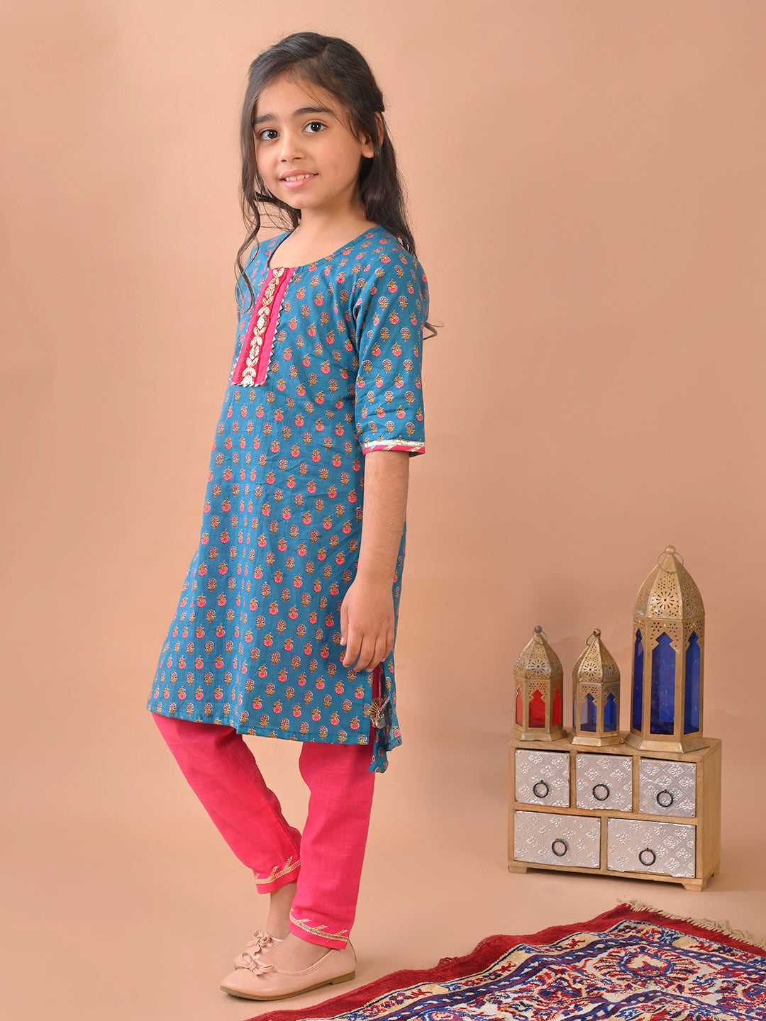 Blue kurti with Lace paired with Pink Plazo pant