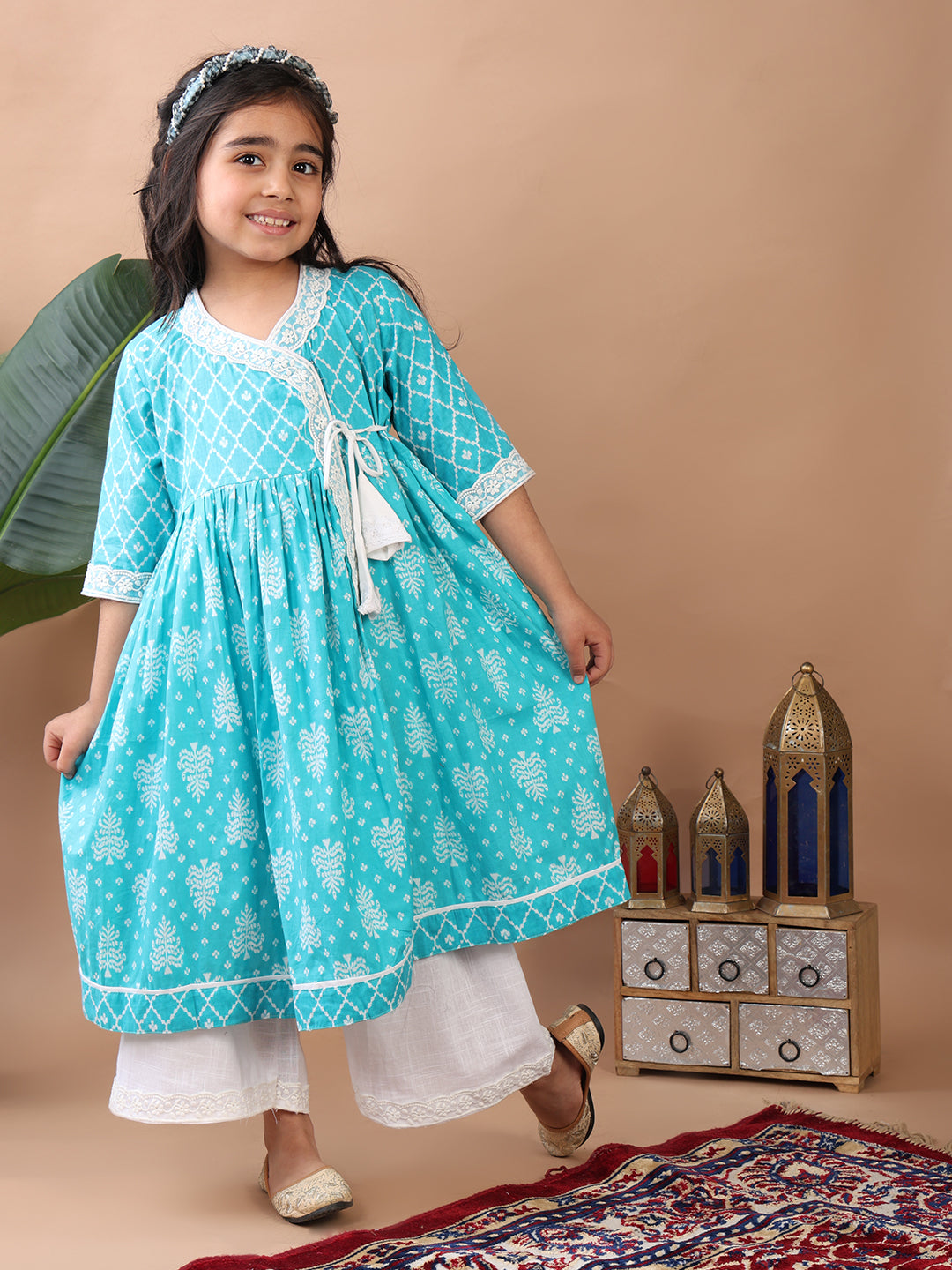 Blue Angrakha Kurti  paired with white Plazo pant