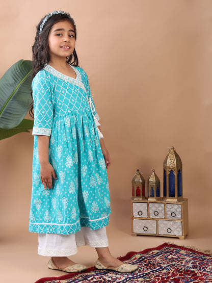 Blue Angrakha Kurti  paired with white Plazo pant