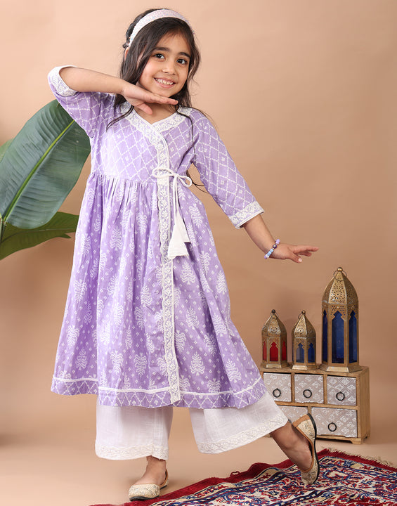 Purple Angrakha Kurti  paired with white Plazo pant
