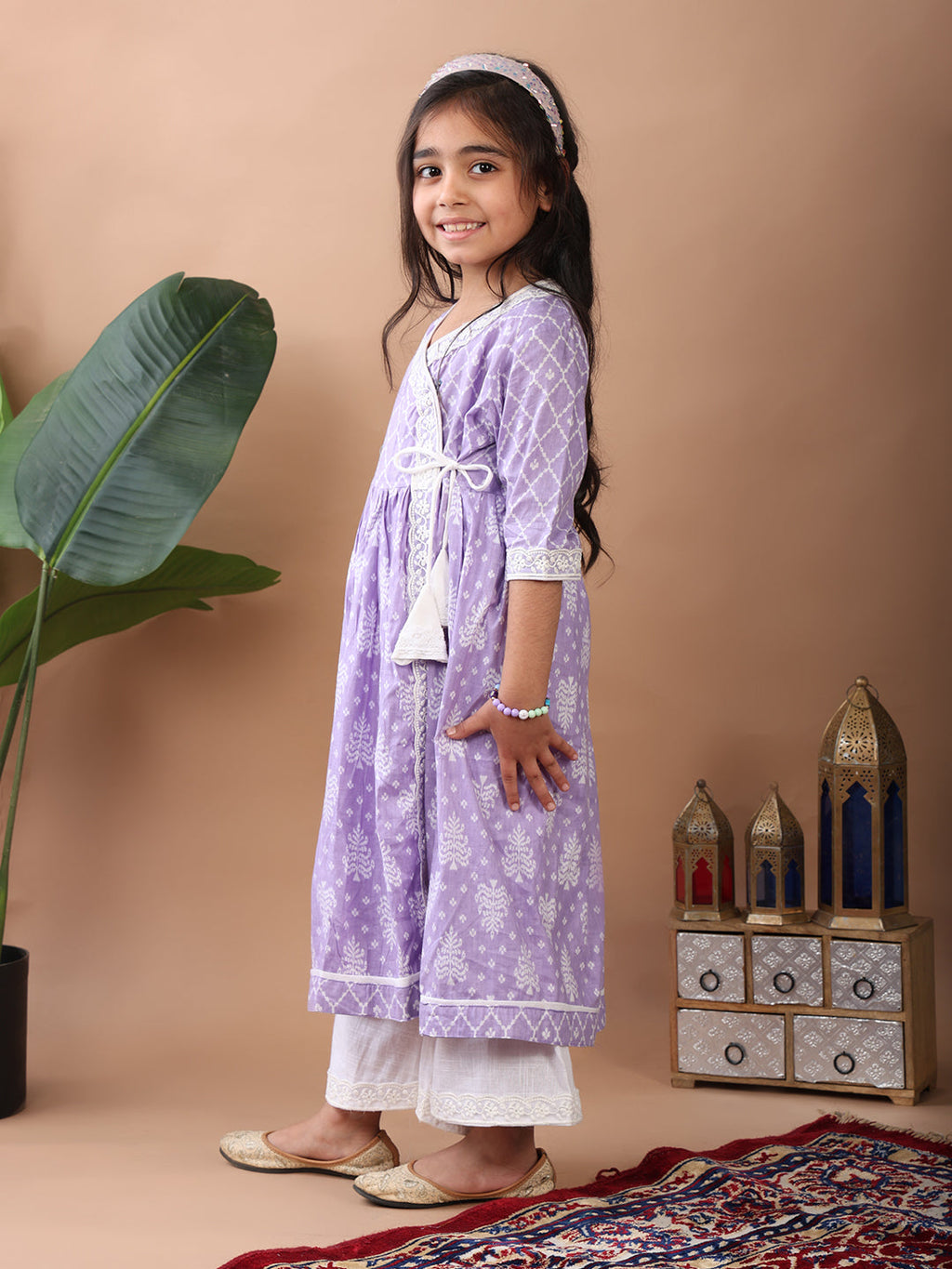 Purple Angrakha Kurti  paired with white Plazo pant