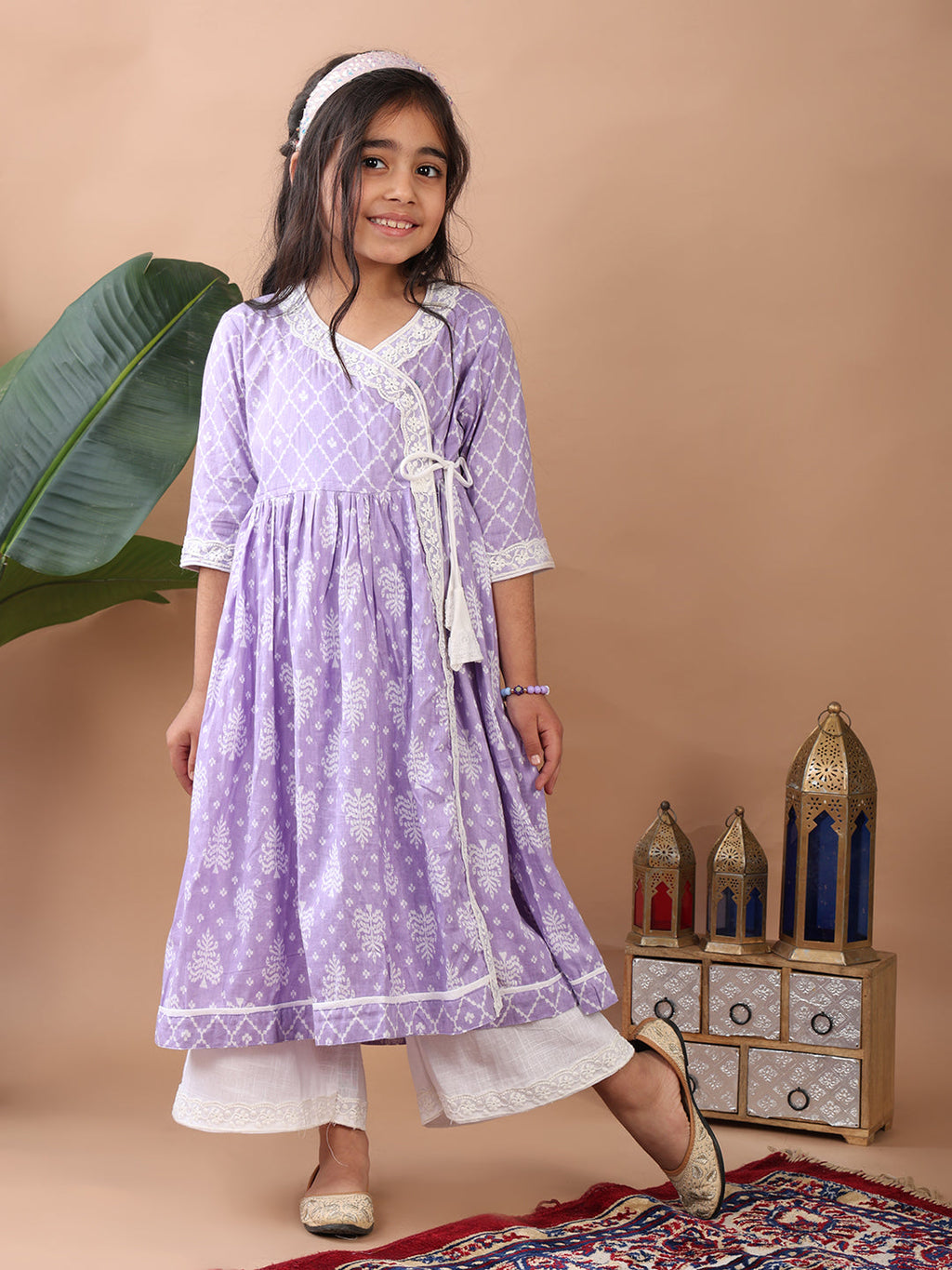Purple Angrakha Kurti  paired with white Plazo pant
