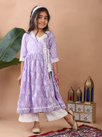 Purple Angrakha Kurti  paired with white Plazo pant