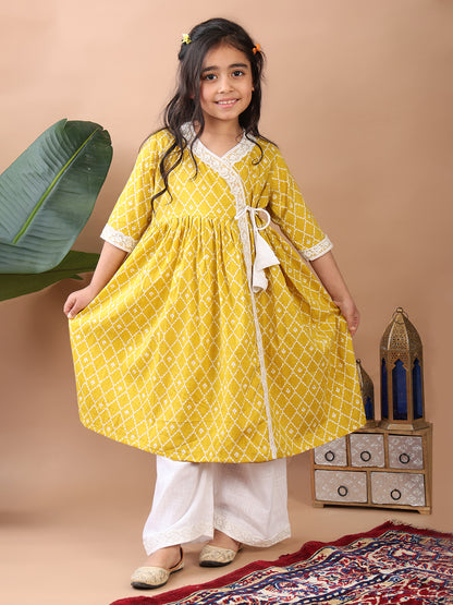 Yellow Angrakha Kurti  paired with white Plazo pant