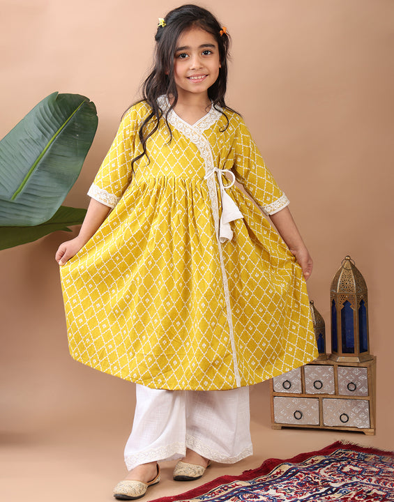 Yellow Angrakha Kurti  paired with white Plazo pant