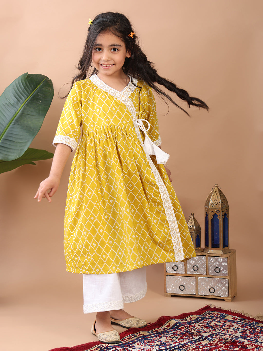 Yellow Angrakha Kurti  paired with white Plazo pant