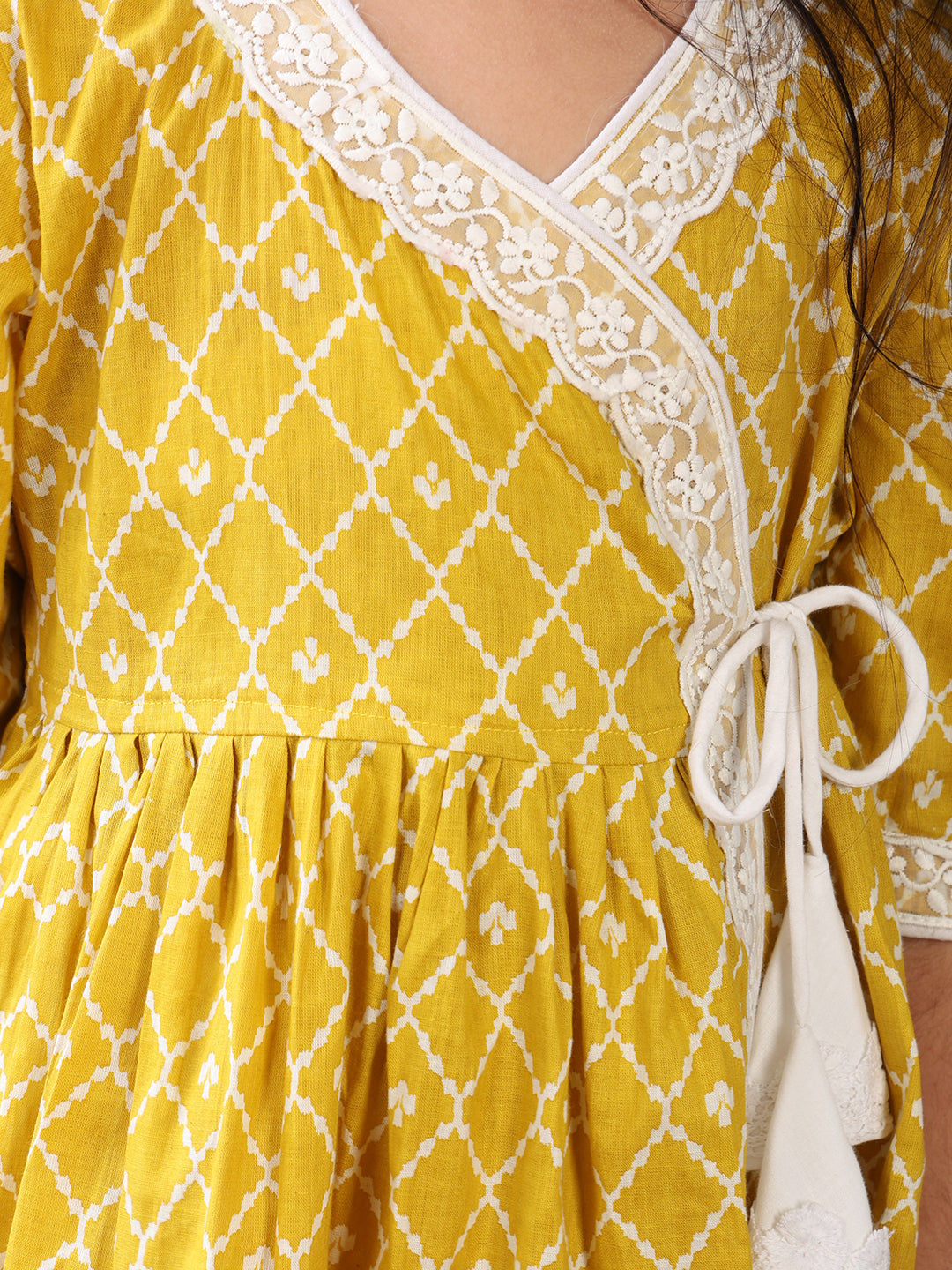 Yellow Angrakha Kurti  paired with white Plazo pant