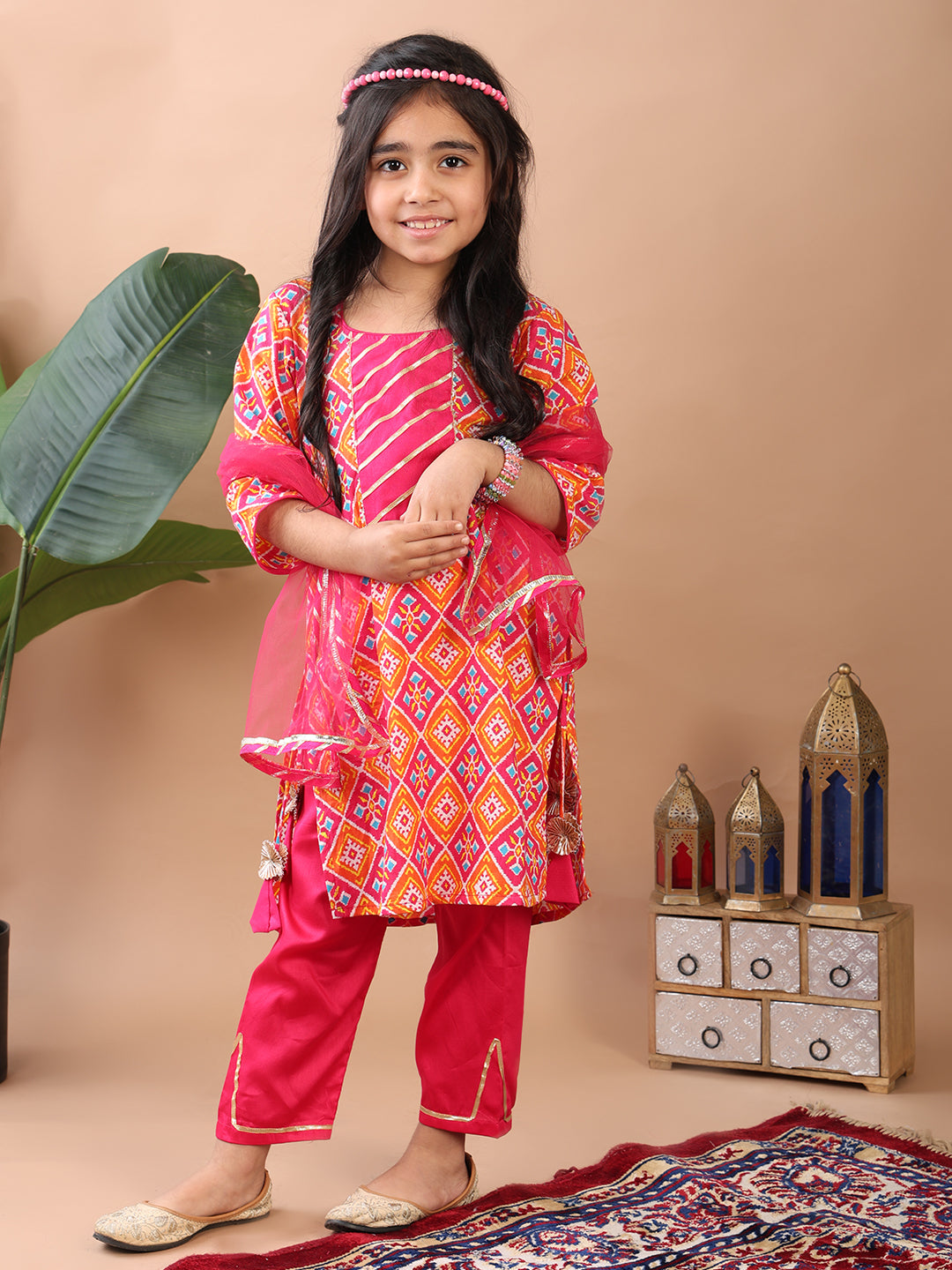 Red  Kurti  paired with pink Plazo pant and dupatta