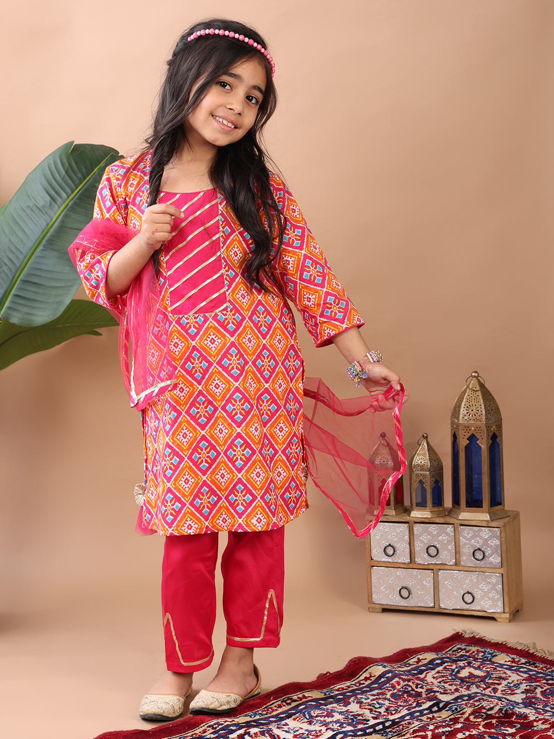 Red  Kurti  paired with pink Plazo pant and dupatta