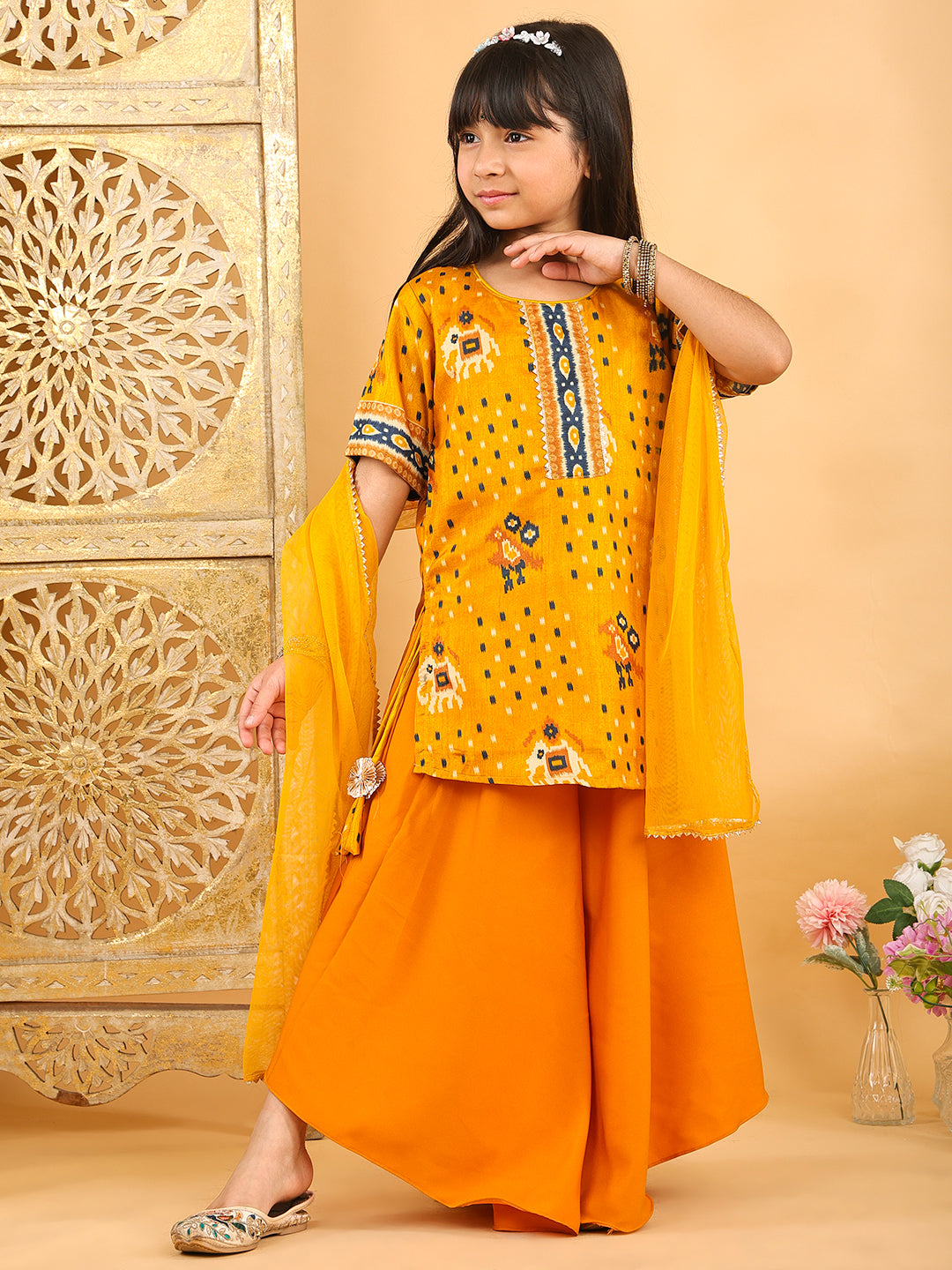 Yellow Patola printed 3/4 Skeeves kurti with flair pant and dupatta