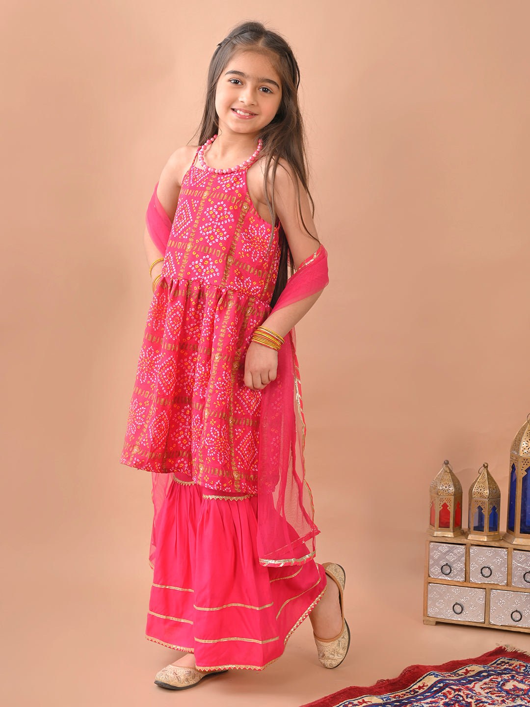 Pink  bandez  sleeveless Kurti  paired with pink sharara pant and dupatta