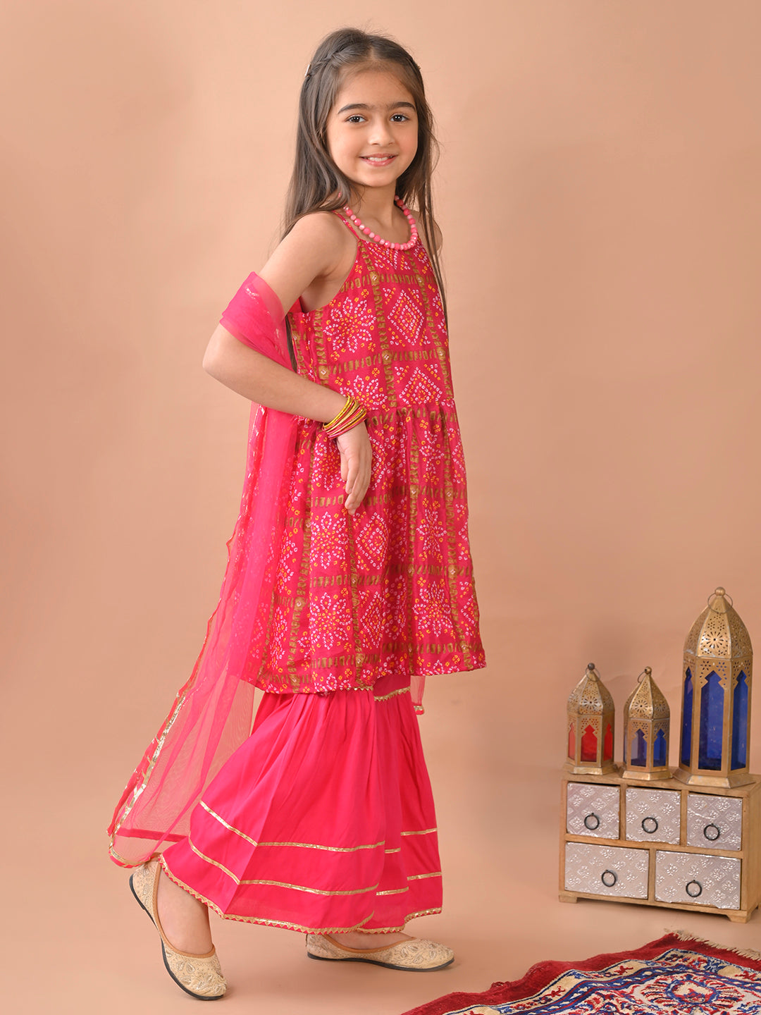 Pink  bandez  sleeveless Kurti  paired with pink sharara pant and dupatta