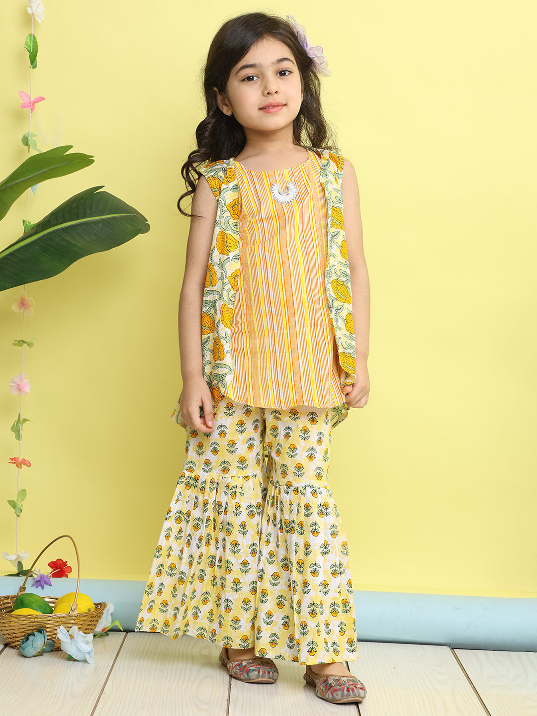 Yellow stripped sleeveless kurti with Floral sharara and jacket
