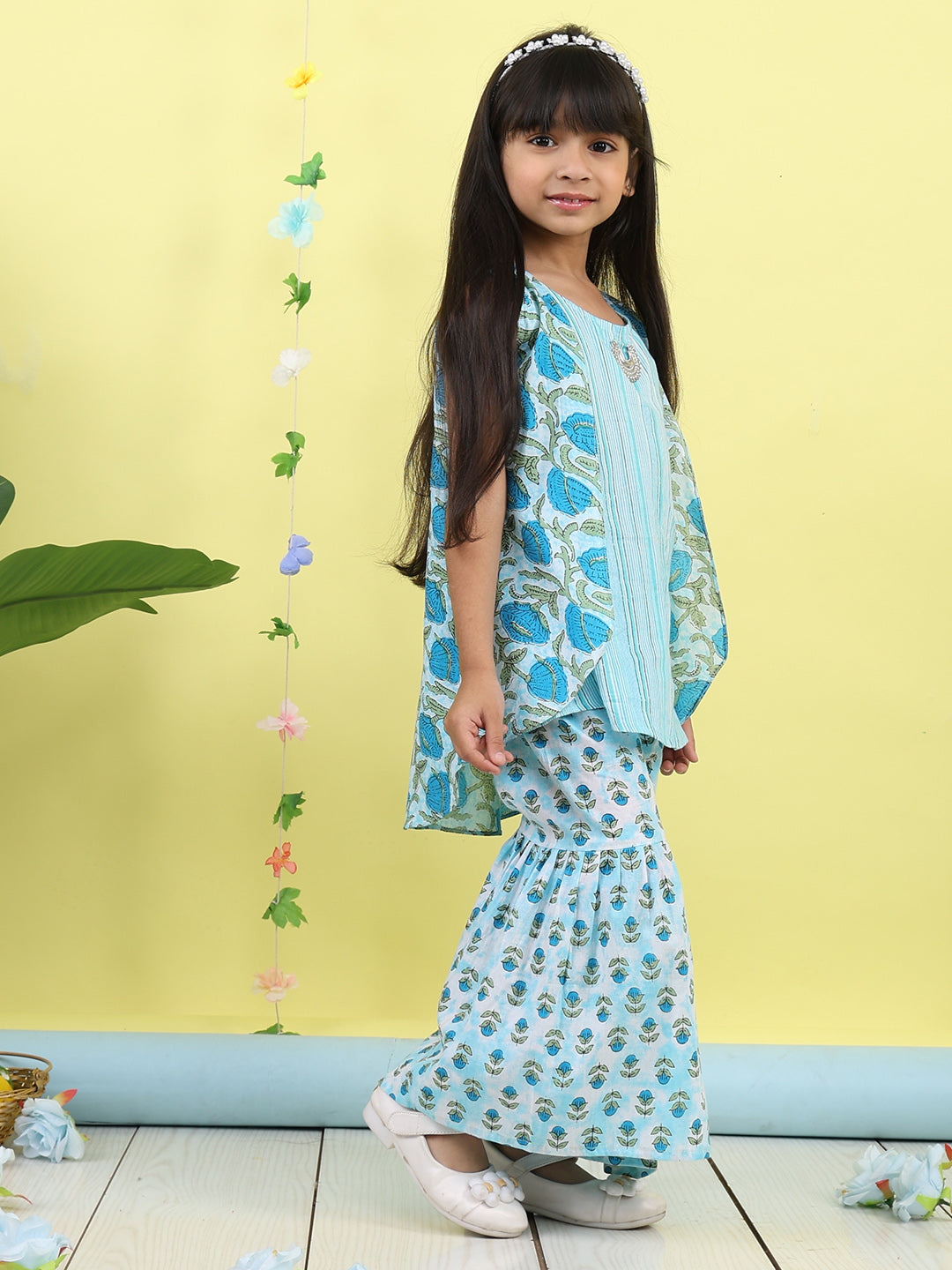 Blue stripped sleeveless kurti with Floral sharara and jacket